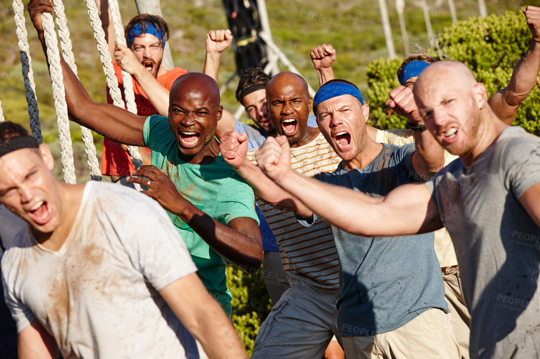 Buy stock photo Cropped shot of a group of men enjoying a military bootcamp