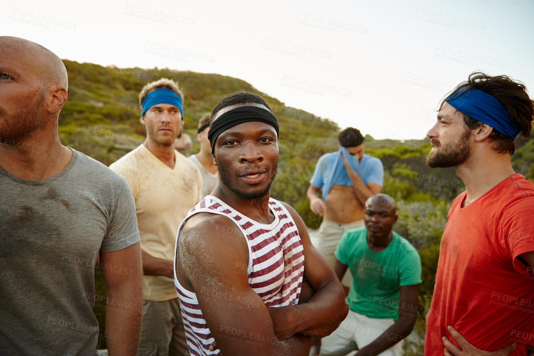 Buy stock photo Portrait of a young man at bootcamp with his friends