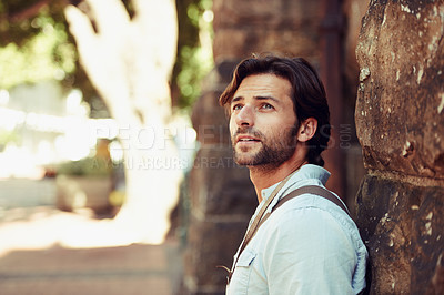 Buy stock photo Tourist, thinking or man in park on holiday, vacation or weekend trip for a adventure in Italy. Relax, travel or male person with fashion, confidence or freedom sightseeing in urban town on journey