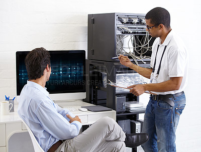 Buy stock photo A young IT specialist ready to fix a server
