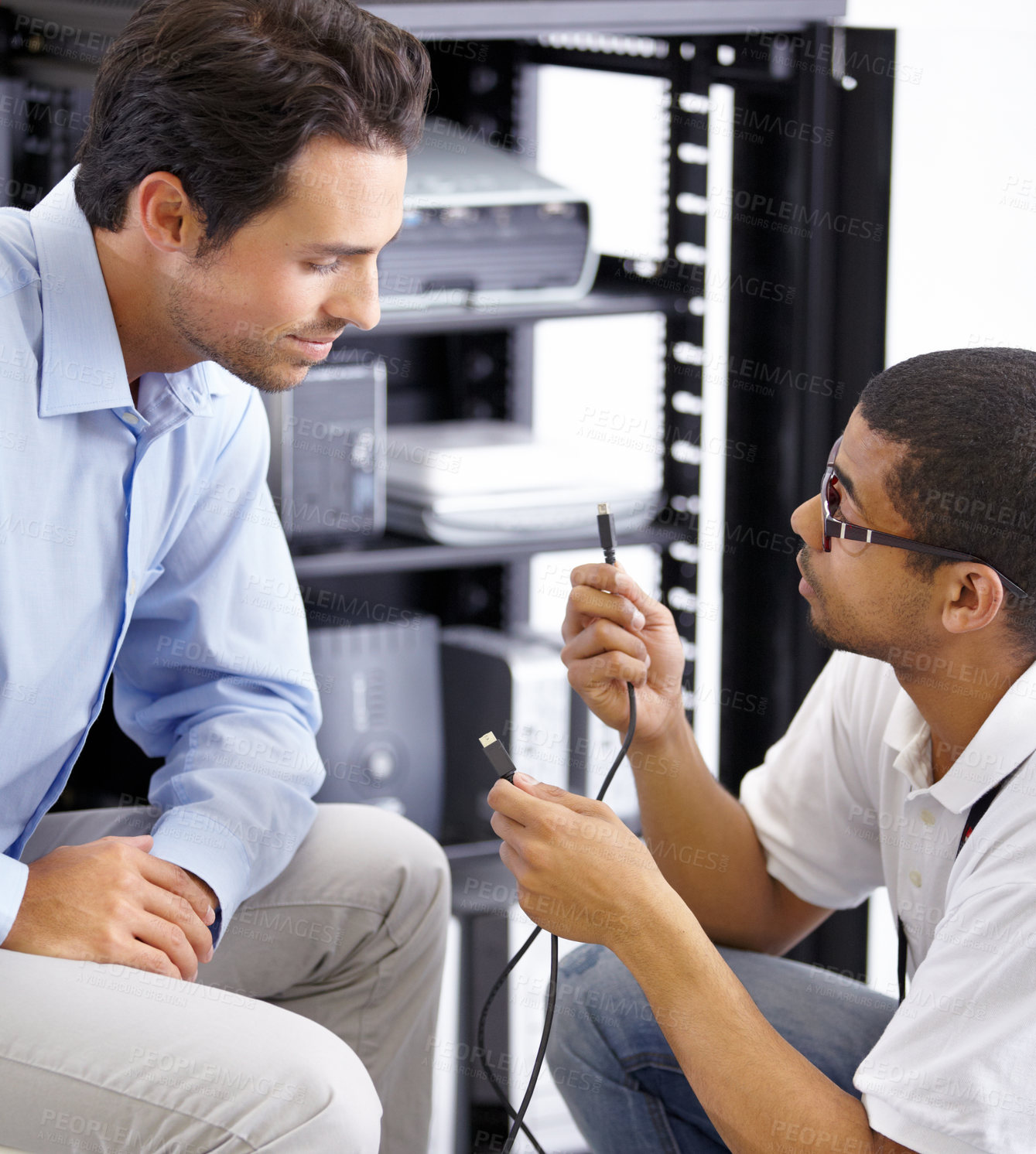 Buy stock photo Server room, it support and cables with a technician explaining to a business man about cyber security hardware. Network, database and consulting with an engineer chatting about wire management