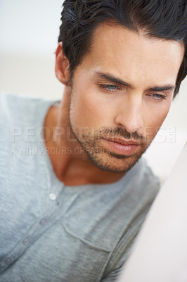 Buy stock photo Thinking, face and man in a house with memory, reflection or brainstorming, serious and thoughtful in his home. Remember, closeup and male person in a living room with worry, concerned or solution