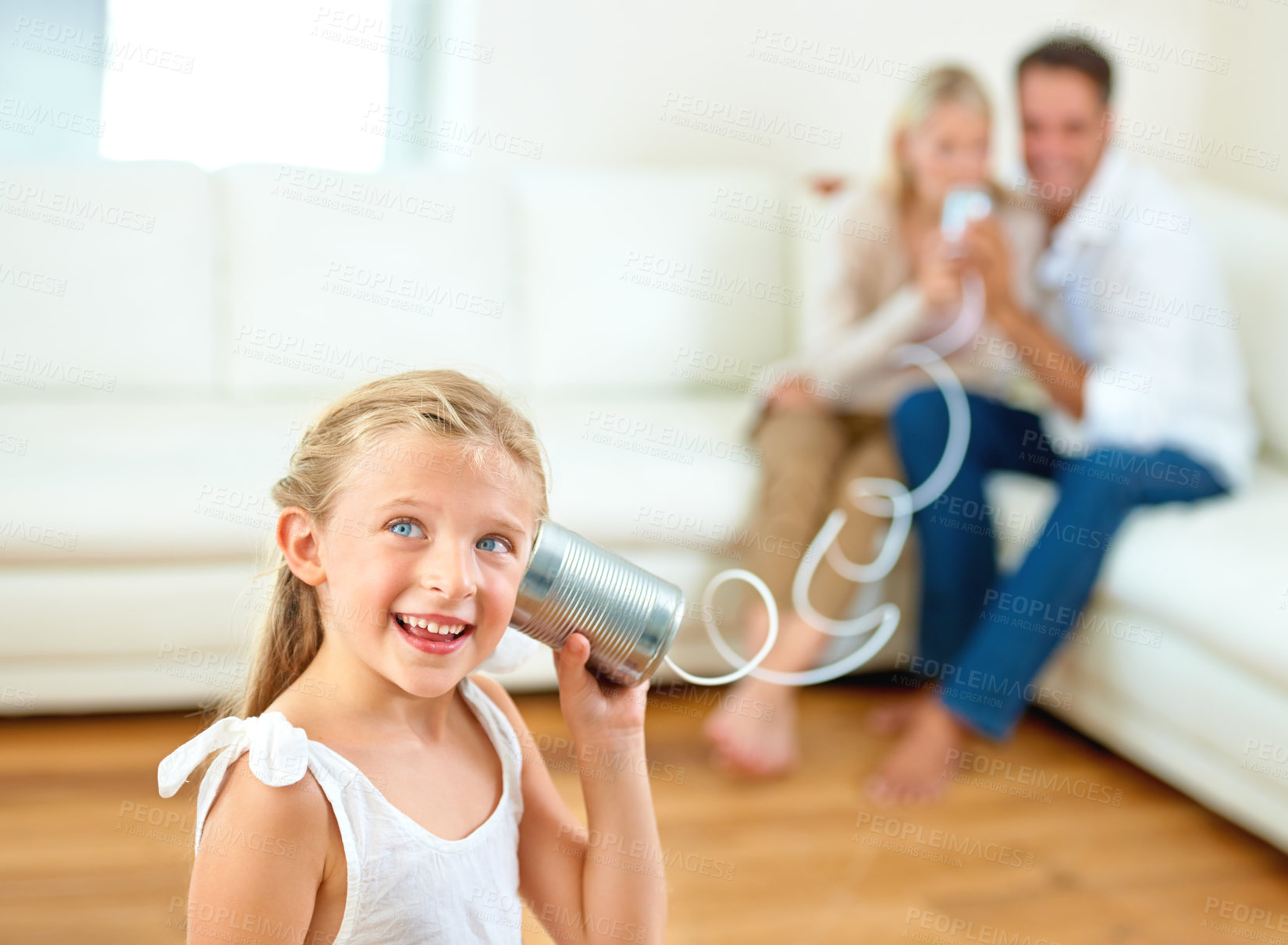 Buy stock photo Portrait, tin can and girl with parents, house and happiness with game, playing and bonding together. Face, kid and child with mother, father on a sofa or cheerful with fun, home or talking in lounge