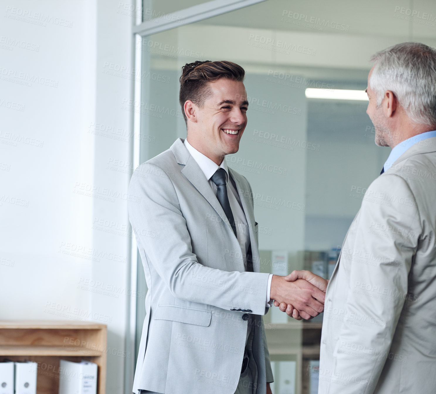 Buy stock photo Handshake, business people and agreement in partnership, happy and thank you for recruitment. Coworkers, networking and introduction for meeting in workplace, collaboration and support in cooperation