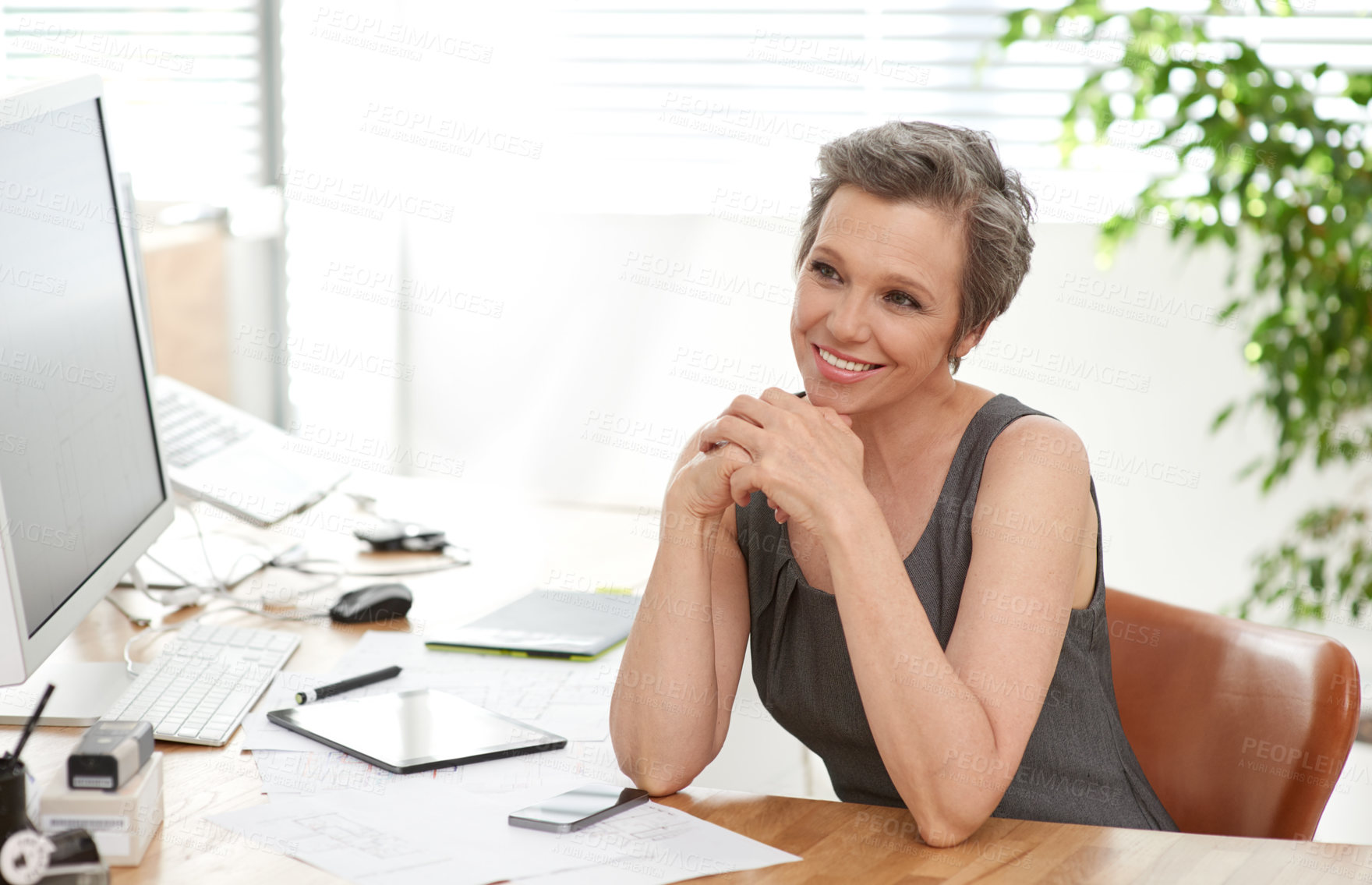 Buy stock photo Mature woman, architect and happy with computer, reading and ideas with review, excited and property in office. Person, pc and blueprint with design, insight and inspiration for real estate project