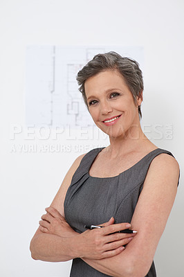 Buy stock photo Portrait, happy engineer and confident businesswoman in startup with blueprint on white wall. Face, professional architect or mature creative manager with arms folded, design or expert with pen in UK