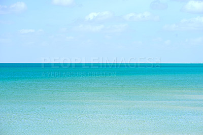 Buy stock photo Blue sky, clouds and background with sea in nature for calm water, peace and outdoor environment. Trip, coast and wallpaper of ocean in morning for climate, ecology and travel destination in Cancun