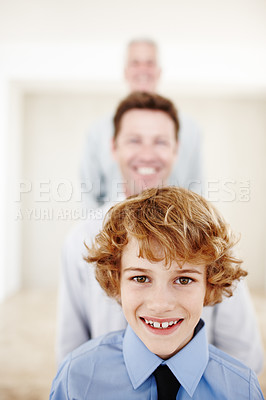 Buy stock photo Father, grandfather and kid in happy family portrait at home with trust, care and support. Love, generation and face of boy bonding with men in house for learning, security or smile in line together