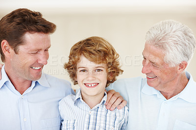 Buy stock photo Boy, portrait and hug for dad or grandpa in home, support and happy for together generations in lounge. Male person, trust and family in childhood, embrace and love in bonding or security in house