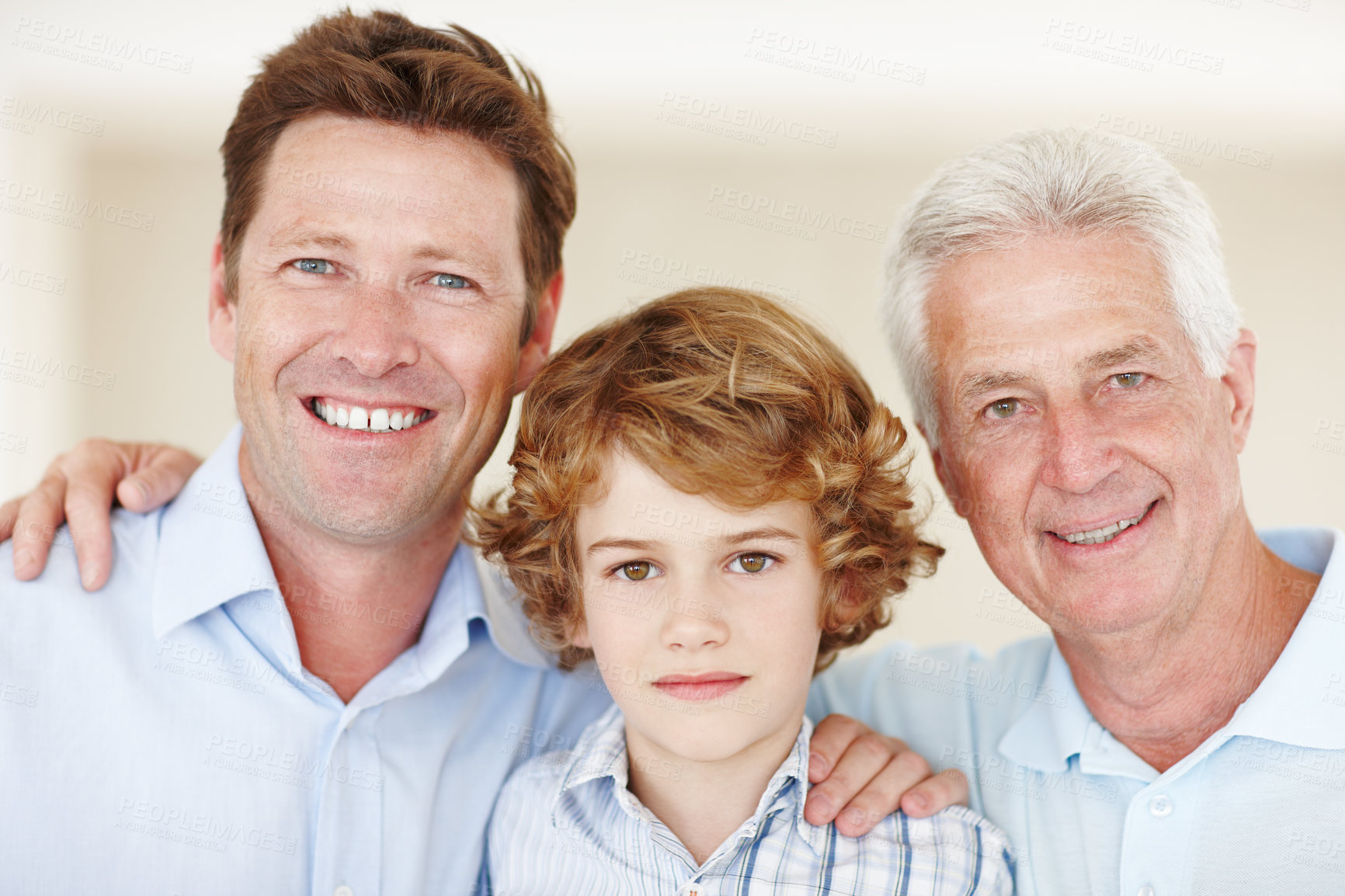 Buy stock photo Boy, portrait and hug with dad or grandpa in home, support and happy for together generations in lounge. Male person, care and smile in childhood, embrace and love in bonding or security in house