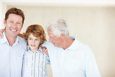 Buy stock photo Grandpa, father and child hug in home for bonding, happy relationship and generations on wall background. Family, portrait and senior grandpa, dad and young boy embrace for love, weekend and relax