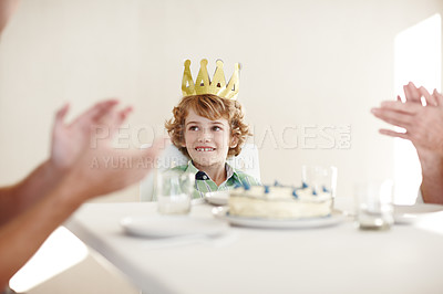 Buy stock photo Shot of two people clapping hands for the birthday boy