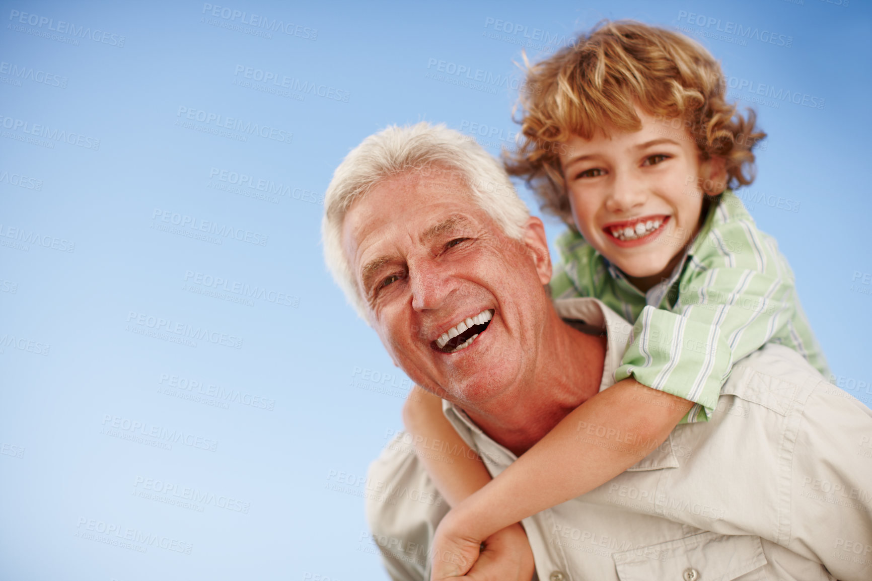 Buy stock photo Happy, blue sky and portrait of grandpa and kid for bonding, relationship and relax together outdoors. Family mockup, nature and grandfather with boy on summer holiday, vacation and weekend at park