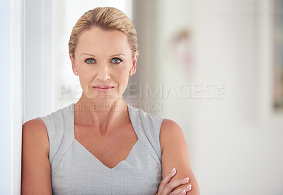 Buy stock photo Cropped portrait of an attractive businesswoman standing in the office