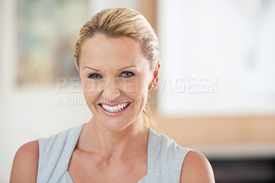Buy stock photo Cropped portrait of an attractive businesswoman standing in the office