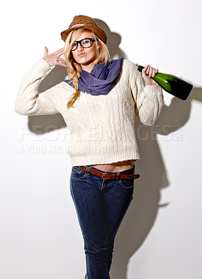 Buy stock photo Champagne, drunk or portrait of woman in studio for a fun celebration, party or adult event. Face, hand gun or wild person drinking alcohol or beverage in bottle for New Year on white background