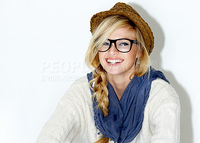 Buy stock photo Cropped studio portrait of a beautiful young woman in a hipster outfit