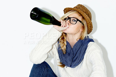 Buy stock photo Fashion, drinking and woman with wine in studio with trendy, cool and stylish outfit and accessories. Alcohol, portrait and female model from Australia with edgy and casual style by white background.