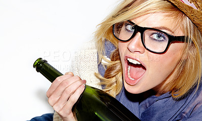 Buy stock photo Champagne, drunk or portrait of woman screaming in studio for a fun celebration, party or event. Face, shouting or wild person drinking alcohol or beverage in bottle for New Year on white background