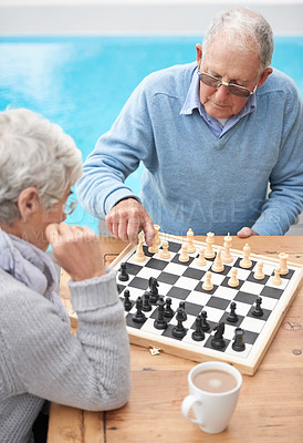 Buy stock photo Chess, relax and old couple thinking while playing a board game in backyard or bonding together. Mind, problem solving or challenge with an elderly man or senior woman in the garden for competition