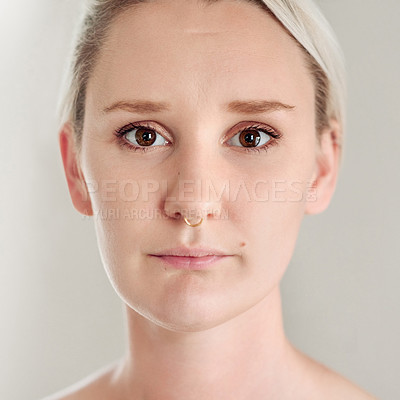 Buy stock photo Headshot of an attractive young woman posing indoors