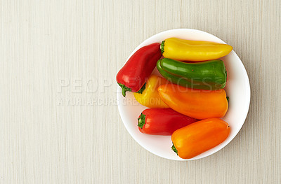 Buy stock photo Healthy, food and bell pepper in kitchen for natural nutrition and background of product for high source of vitamin c. Above, diet and fresh vegetables for salad, lunch or dinner in bowl or house