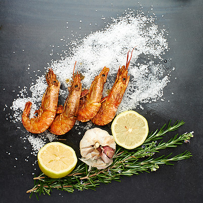 Buy stock photo Healthy, food and prawns with herbs on table for natural, organic and nutrition to prepare seafood dish. Pescatarian, fish and protein with minerals to prevent cancer to diet for weight loss