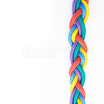 Buy stock photo Colourful ropes knotted together isolated against a white studio background. Connected group of many different ropes tied and linked together. Community, trust and faith metaphor for learning