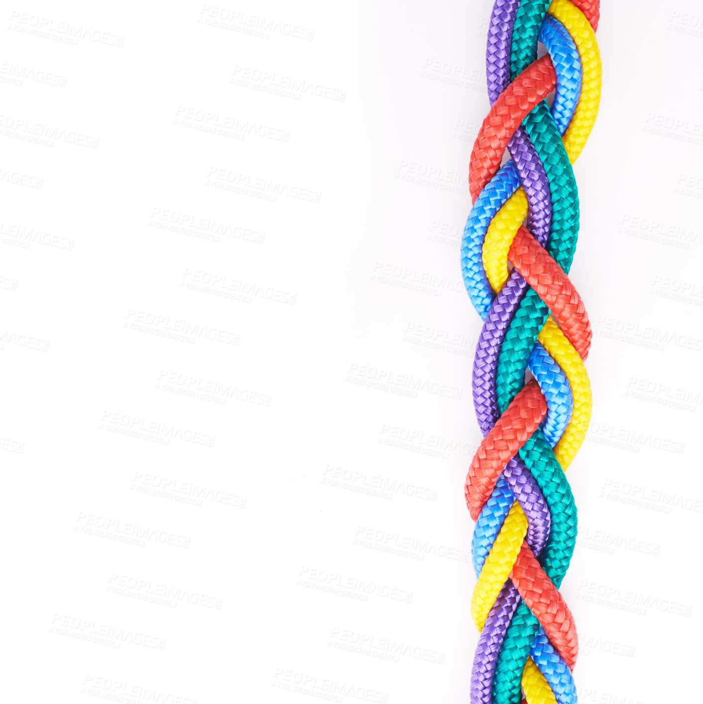 Buy stock photo Colourful ropes knotted together isolated against a white studio background. Connected group of many different ropes tied and linked together. Community, trust and faith metaphor for learning