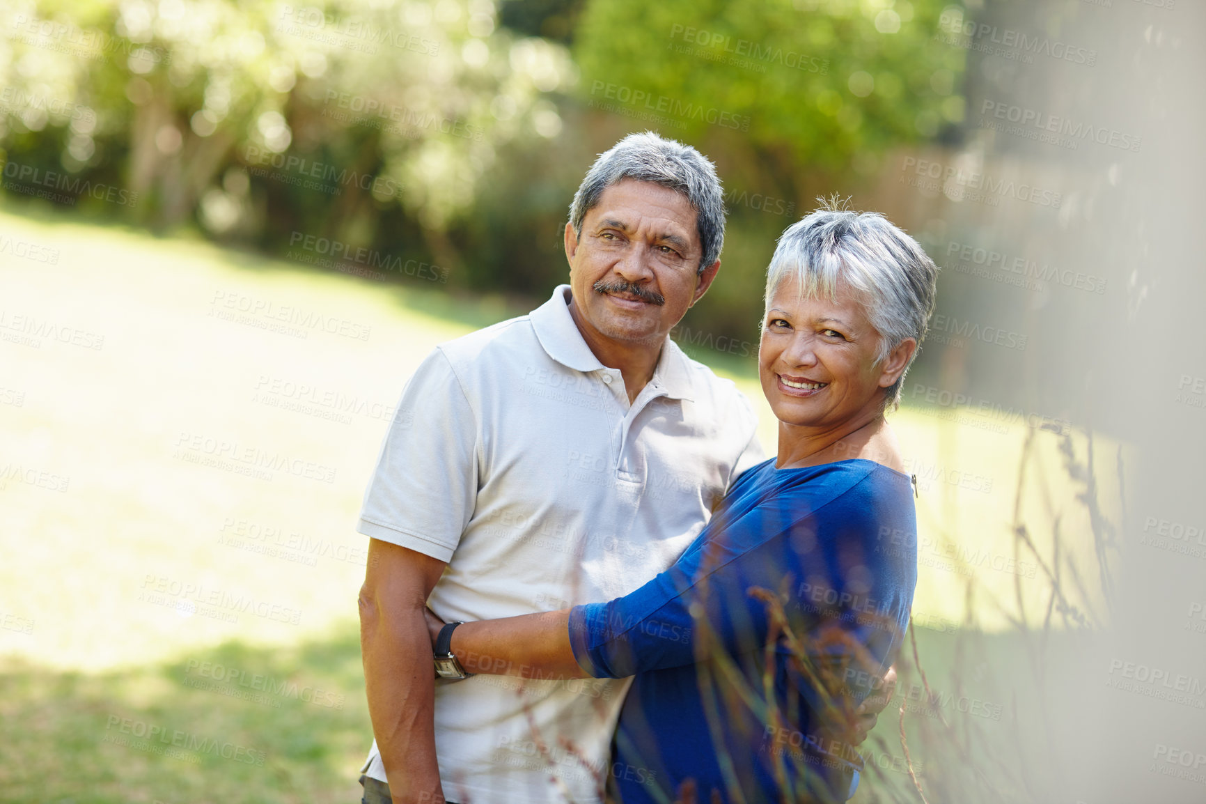 Buy stock photo Shot of a loving senior couple enjoying quality time together outdoors