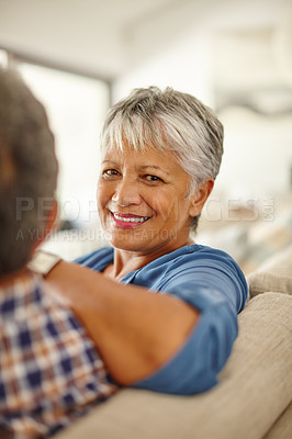 Buy stock photo Shot of a happy senior couple enjoying quality time together at home