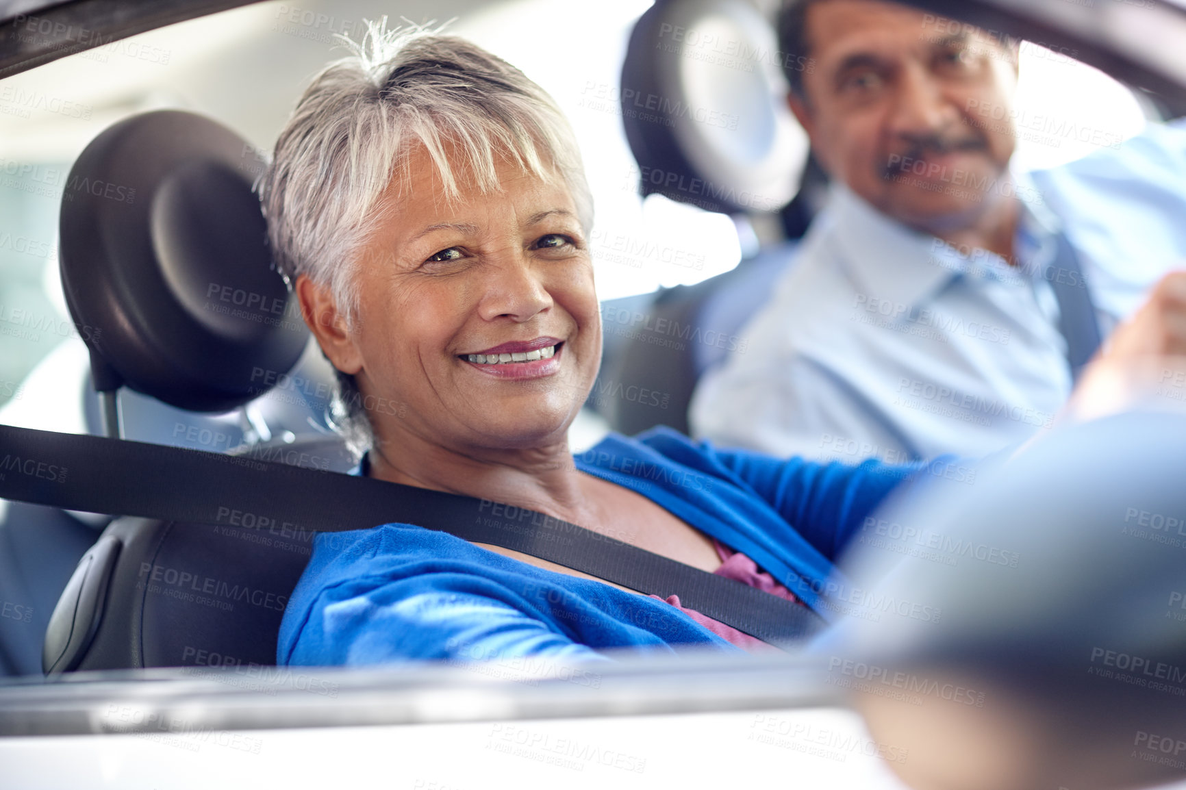 Buy stock photo Shot of a senior couple going for a drive together in a car