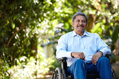 Buy stock photo Cropped portrait of a senior man sitting in a wheelchair outside