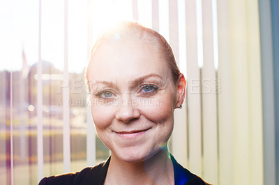 Buy stock photo Portrait of an attractive businesswoman standing in the office