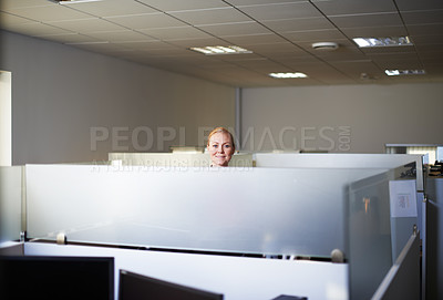 Buy stock photo Portrait of an attractive young woman standing in her office cubicle