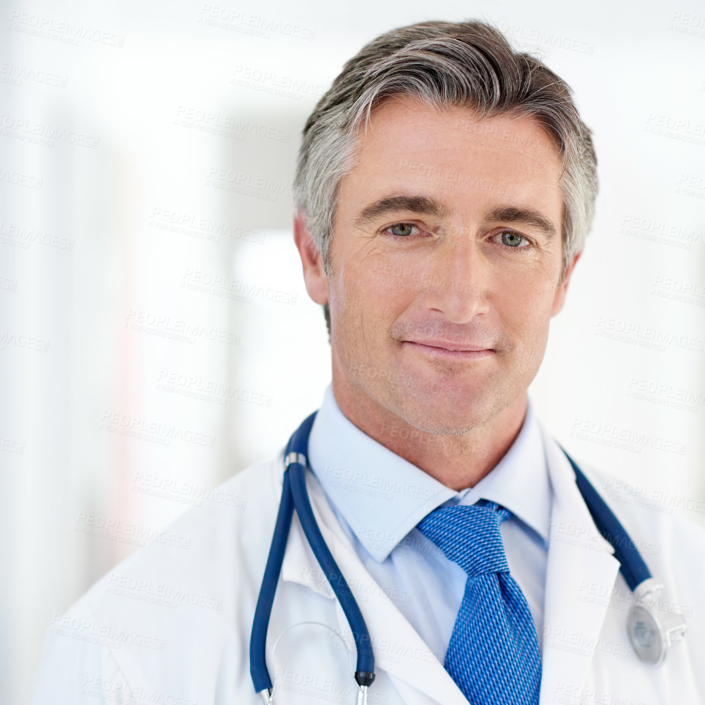 Buy stock photo Portrait, doctor and man in clinic, pride and stethoscope with wellness, white coat and cardiology. Face, person or medical with professional, career ambition and employee with expert in hospital