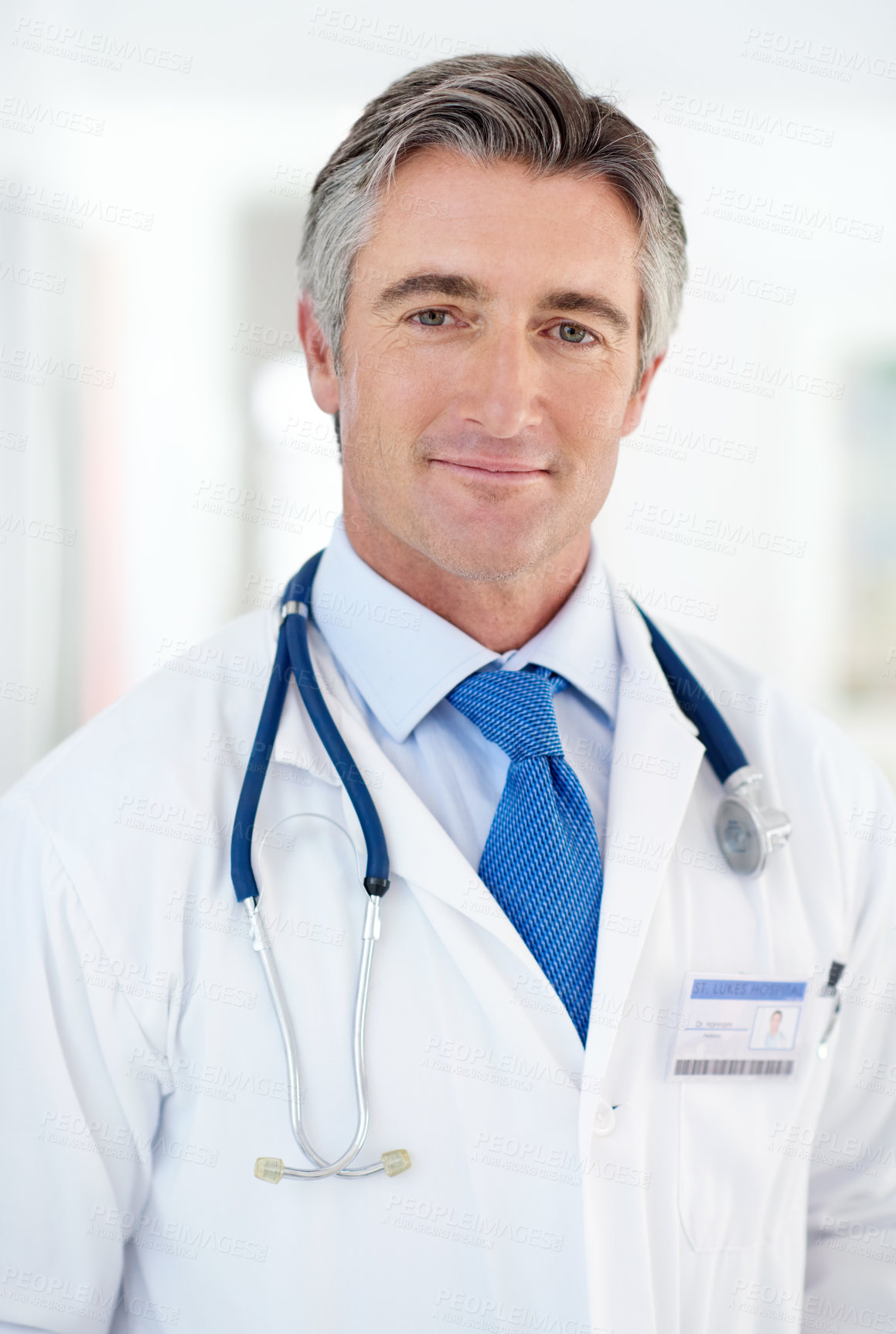 Buy stock photo Portrait of a doctor standing in an office