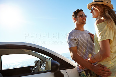 Buy stock photo Cropped shot of an affectionate young couple on a roadtrip