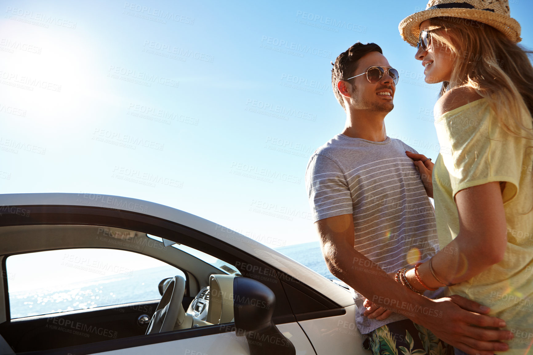 Buy stock photo Cropped shot of an affectionate young couple on a roadtrip