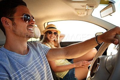 Buy stock photo Cropped shot of a young couple on a roadtrip