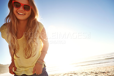 Buy stock photo Cropped shot of an attractive young woman on the beach