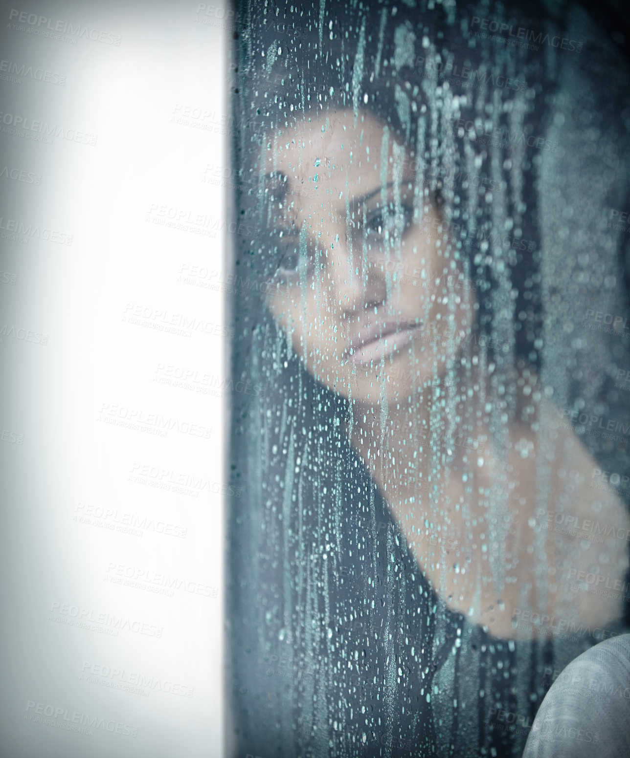 Buy stock photo Sad, rain and thinking with woman by window for depression, tired and lonely. Anxiety, mental health and exhausted with female contemplating at home for broken heart, disappointed and fear mockup