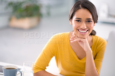 Buy stock photo Cropped shot of an attractive young businesswoman sitting at her desk