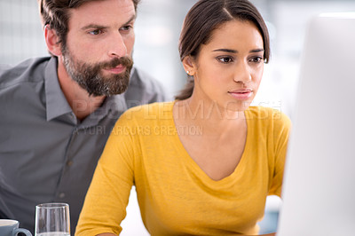 Buy stock photo Computer, reading and manager with woman in office with research for creative project online. Career, technology and professional man helping female designer work on internet with laptop in workplace