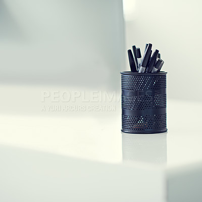 Buy stock photo Pen, container and desk as writing stationery in office for organization of tools supply for drawing, signature or creative. Marker, holder and storage in New York or equipment, college or school