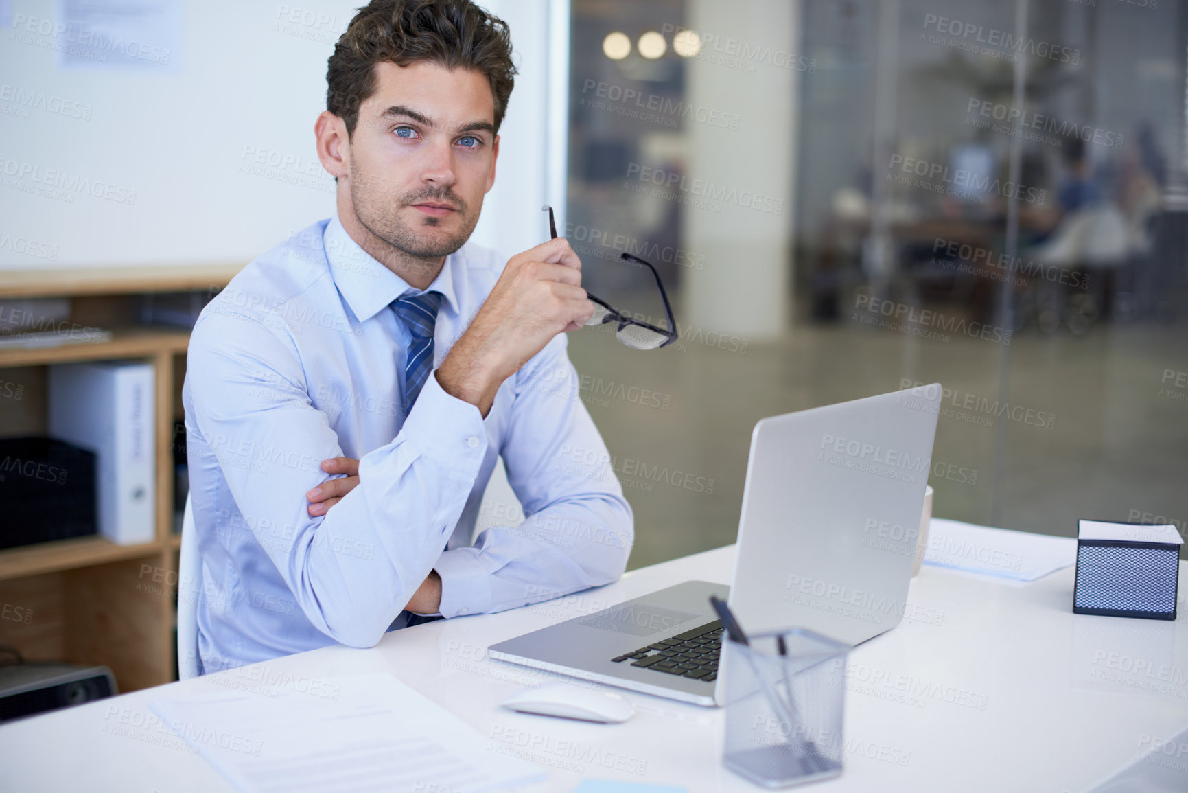 Buy stock photo Businessman, portrait and laptop  office with confidence at desk as financial advisor, planning or investing. Male person, glasses and face in New York or corporate employee, accounting or research