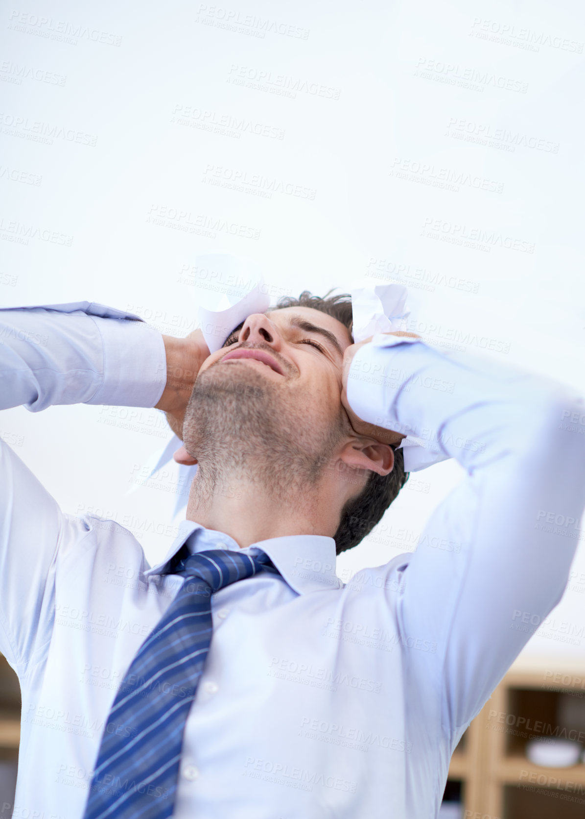 Buy stock photo Businessman, office and crumpled paper with frustrated, stress and headache for startup or company. Employee, workspace and mistake for review, failure or burnout for corporate mental health