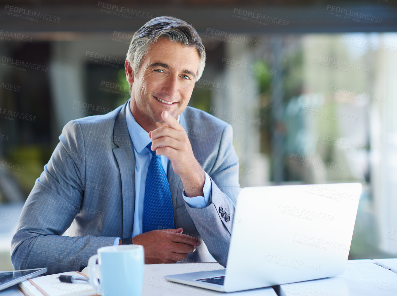 Buy stock photo Business, man and happy on laptop with pointing on portrait for research on project in Germany. Mature person, male employee and smile with pride in confidence on internet for stock market value