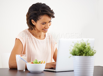 Buy stock photo Laptop, breakfast and remote work with an entrepreneur woman in her home for health, diet or nutrition. Computer, startup or small business with a happy young freelancer eating a meal in the morning