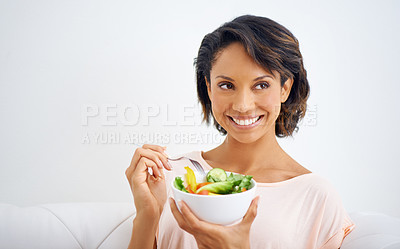 Buy stock photo Happy, health and young woman with a salad at home with vegetables for wellness, organic or diet. Smile, nutrition and female person from Mexico eating healthy meal with produce in living room.